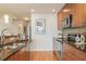 Kitchen with stainless steel appliances, granite countertops, wood cabinets, and a stainless sink at 3300 Windy Ridge Se Pkwy # 1309, Atlanta, GA 30339