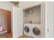 Convenient laundry closet with stacked washer and dryer units at 3300 Windy Ridge Se Pkwy # 1309, Atlanta, GA 30339