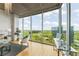 Modern living area with floor-to-ceiling windows and scenic city views at 3300 Windy Ridge Se Pkwy # 1309, Atlanta, GA 30339