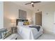 Bedroom featuring a large bed, decorative lamps, and accent chair at 3300 Windy Ridge Se Pkwy # 1309, Atlanta, GA 30339