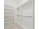Spacious walk-in closet with built-in shelving and ample storage space at 3300 Windy Ridge Se Pkwy # 1309, Atlanta, GA 30339