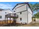 Exterior view of a home with a charming two-story deck and landscaped yard at 1972 Cambridge Ave, Atlanta, GA 30337