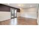 Living room featuring hardwood floors and stylish French doors leading to outdoor patio at 1972 Cambridge Ave, Atlanta, GA 30337