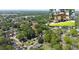 Bird's-eye view showcases this home nestled in a verdant, established neighborhood at 308 Reed St, Scottdale, GA 30079