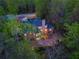 Aerial shot showcases home, with lush trees, offering privacy and natural beauty at 4231 Carrington Ct, Douglasville, GA 30135