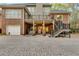 Charming two-story brick home with a garage and outdoor patio area, perfect for entertaining at 4231 Carrington Ct, Douglasville, GA 30135