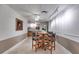Basement rec room with kitchenette, ceiling fan and small table and chairs at 4231 Carrington Ct, Douglasville, GA 30135