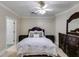 Cozy bedroom with large dresser and two nightstands beside a queen size bed at 4231 Carrington Ct, Douglasville, GA 30135