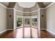 Spacious bedroom with large windows and hardwood floors provides lots of natural light at 4231 Carrington Ct, Douglasville, GA 30135