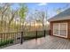 Beautiful deck with black railing, offering serene views and a peaceful outdoor space at 4231 Carrington Ct, Douglasville, GA 30135