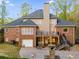 Spacious backyard with an outdoor patio area, perfect for entertaining and relaxing at 4231 Carrington Ct, Douglasville, GA 30135