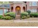 Welcoming brick front entrance with double doors and manicured greenery at 4231 Carrington Ct, Douglasville, GA 30135