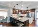 Gourmet kitchen with granite counters, stainless appliances, and breakfast bar seating at 4231 Carrington Ct, Douglasville, GA 30135