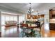 Open concept living area flows into an updated kitchen with dark wood cabinets at 4231 Carrington Ct, Douglasville, GA 30135