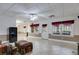 Spacious living room with tile floors, neutral paint, and a ceiling fan at 4231 Carrington Ct, Douglasville, GA 30135