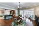 A well-lit living room with hardwood floors offers an open floor plan at 4231 Carrington Ct, Douglasville, GA 30135