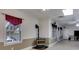 Spacious room featuring a fireplace and multiple windows with bright natural light at 4231 Carrington Ct, Douglasville, GA 30135