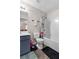 Functional bathroom with a vanity, toilet, and tub/shower combo, maximizing space with practical fixtures at 6407 Barker Station Walk, Sugar Hill, GA 30518