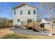 The home features a backyard with a deck and dedicated fire pit at 1611 Flat Shoals Rd, Atlanta, GA 30316