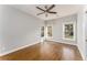 Sunlit bedroom with hardwood flooring and many windows at 1611 Flat Shoals Rd, Atlanta, GA 30316