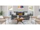 Comfortable living room with a stylish rug, a gray sofa, and modern decor, creating a cozy atmosphere at 1611 Flat Shoals Rd, Atlanta, GA 30316