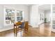 Inviting office space with hardwood floors, a desk, and French doors leading to another room at 1611 Flat Shoals Rd, Atlanta, GA 30316
