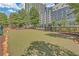 Well-maintained community dog park with benches, pet waste stations, and secure fencing for residents to enjoy at 390 17Th Nw St # 4048, Atlanta, GA 30363