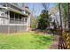 The backyard features a charming fire pit area with seating, perfect for enjoying evenings outdoors at 430 Holly Stream Trl, Roswell, GA 30075