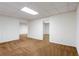Finished basement with neutral carpet, drop ceiling, and multiple access points at 430 Holly Stream Trl, Roswell, GA 30075