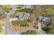 Aerial view of a landscaped single-Gathering home on a cul-de-sac in a suburban neighborhood at 4537 Ashmore Cir, Marietta, GA 30066