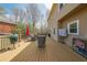 Spacious back deck features an outdoor grill, patio furniture and backs up to mature trees at 4537 Ashmore Cir, Marietta, GA 30066