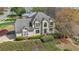 Stately two-story home with lush landscaping and mature trees providing shade and curb appeal at 4537 Ashmore Cir, Marietta, GA 30066