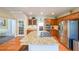 Large kitchen island with granite countertop and stainless steel appliances at 4537 Ashmore Cir, Marietta, GA 30066