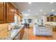 Bright kitchen with granite countertops, hardwood floors, stainless steel appliances and large island at 4537 Ashmore Cir, Marietta, GA 30066