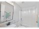 Bathroom with a combination shower and tub with granite counters on the sink at 340 Taylor Path, Dallas, GA 30157