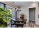 Cozy dining area with hardwood floors, natural light, and stylish decor at 340 Taylor Path, Dallas, GA 30157