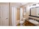 Bathroom featuring a shower-tub combo, toilet, and a sink with vanity at 837 Forrest Se Cir, Atlanta, GA 30354