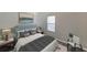 Bedroom with a comfortable bed, side tables, and a soft rug at 837 Forrest Se Cir, Atlanta, GA 30354