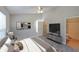 Bright bedroom featuring a ceiling fan, artwork, with an ensuite bathroom at 837 Forrest Se Cir, Atlanta, GA 30354
