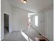 Open-concept living room features neutral paint and carpet at 837 Forrest Se Cir, Atlanta, GA 30354