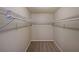 A spacious walk-in closet featuring metal racks for optimal storage at 837 Forrest Se Cir, Atlanta, GA 30354