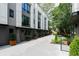 Exterior facade of townhome row featuring manicured landscaping at 1160 Ormewood Ave # 13, Atlanta, GA 30316