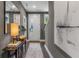 Inviting entryway with modern decor, a stylish rug, and a decorative mirror at 1160 Ormewood Ave # 13, Atlanta, GA 30316