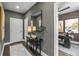 Hallway featuring modern console table, a decorative mirror, and entry to office at 1160 Ormewood Ave # 13, Atlanta, GA 30316