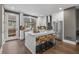 Bright kitchen boasts modern appliances, a quartz island with seating, and sleek cabinets at 1160 Ormewood Ave # 13, Atlanta, GA 30316