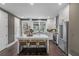 Bright kitchen with white cabinets, stainless steel appliances, and large center island at 1160 Ormewood Ave # 13, Atlanta, GA 30316