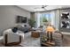 Modern living room with large window, stylish seating, and contemporary decor at 1160 Ormewood Ave # 13, Atlanta, GA 30316