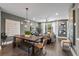 Open-concept living area with modern lighting, stylish furniture, and hardwood floors at 1160 Ormewood Ave # 13, Atlanta, GA 30316