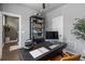 Well-lit home office with a modern desk, stylish decor, and ample shelving at 1160 Ormewood Ave # 13, Atlanta, GA 30316