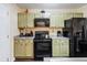 Kitchen boasting updated appliances, granite counters, and ample cabinet space for storage and food prep at 1501 Eastern Sunrise Ln, Decatur, GA 30034